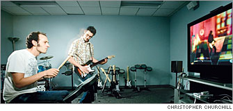 Alex Rigopulos on drums and Eran Egozy on guitar