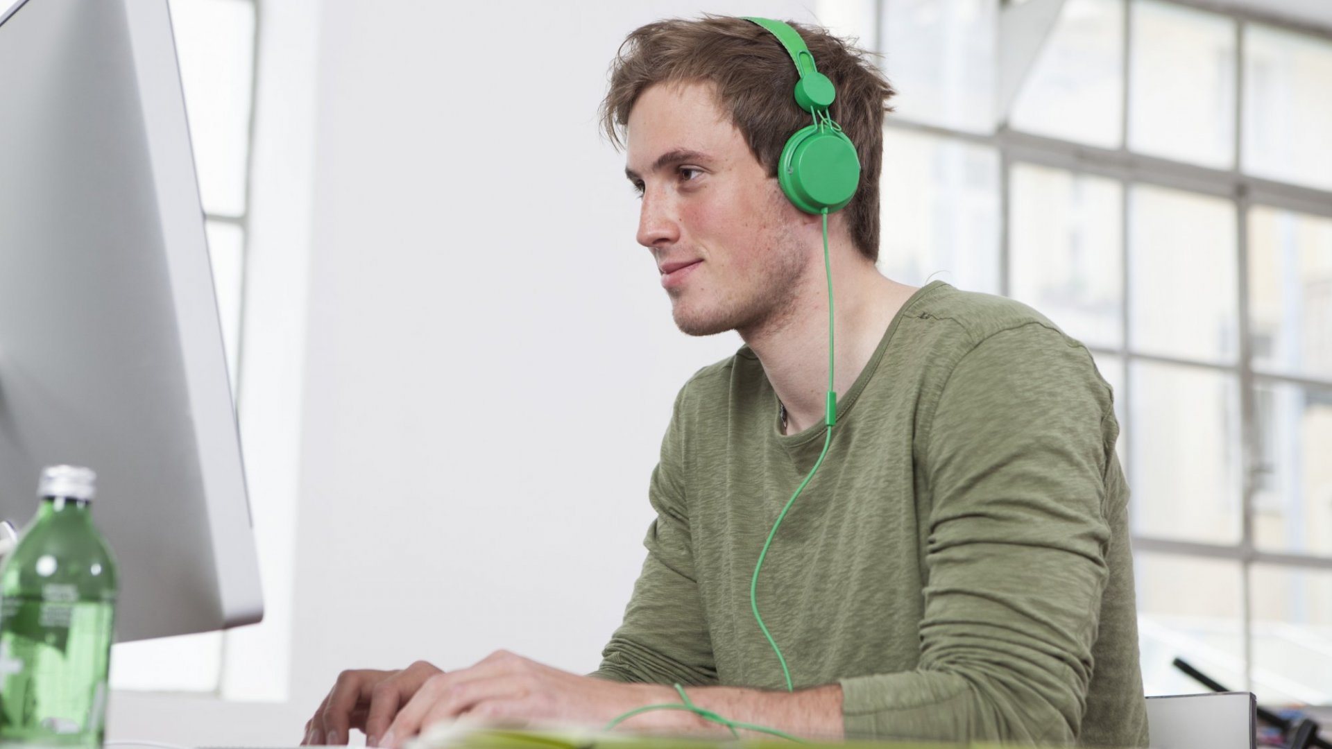 While listening to music. Working man listening music man.